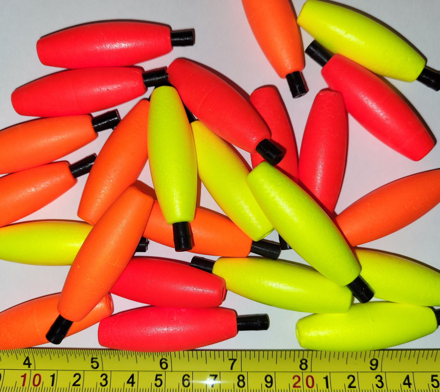 24 of the 2" Pegged Styrofoam, Cigar Shaped fishing floats. Choose from Bright Fire Red, Bright Orange, Bright Yellow or Assortment of the 3