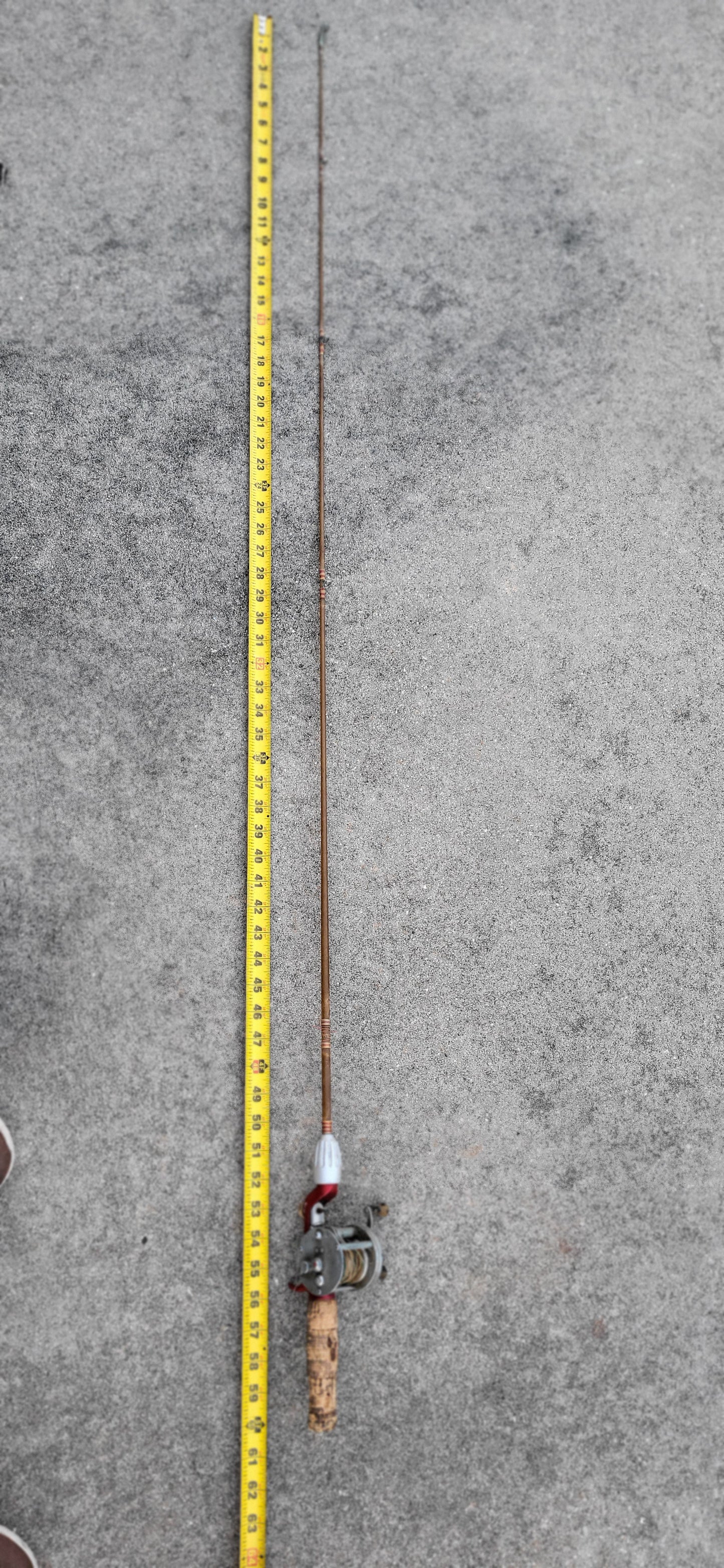 Vintage Fishing Reel and Solid Glass Rod. Montgomery Ward No. 69 6310 Model 5B Reel. 5 ft total length of Rod. Reel Made by Shakespeare.